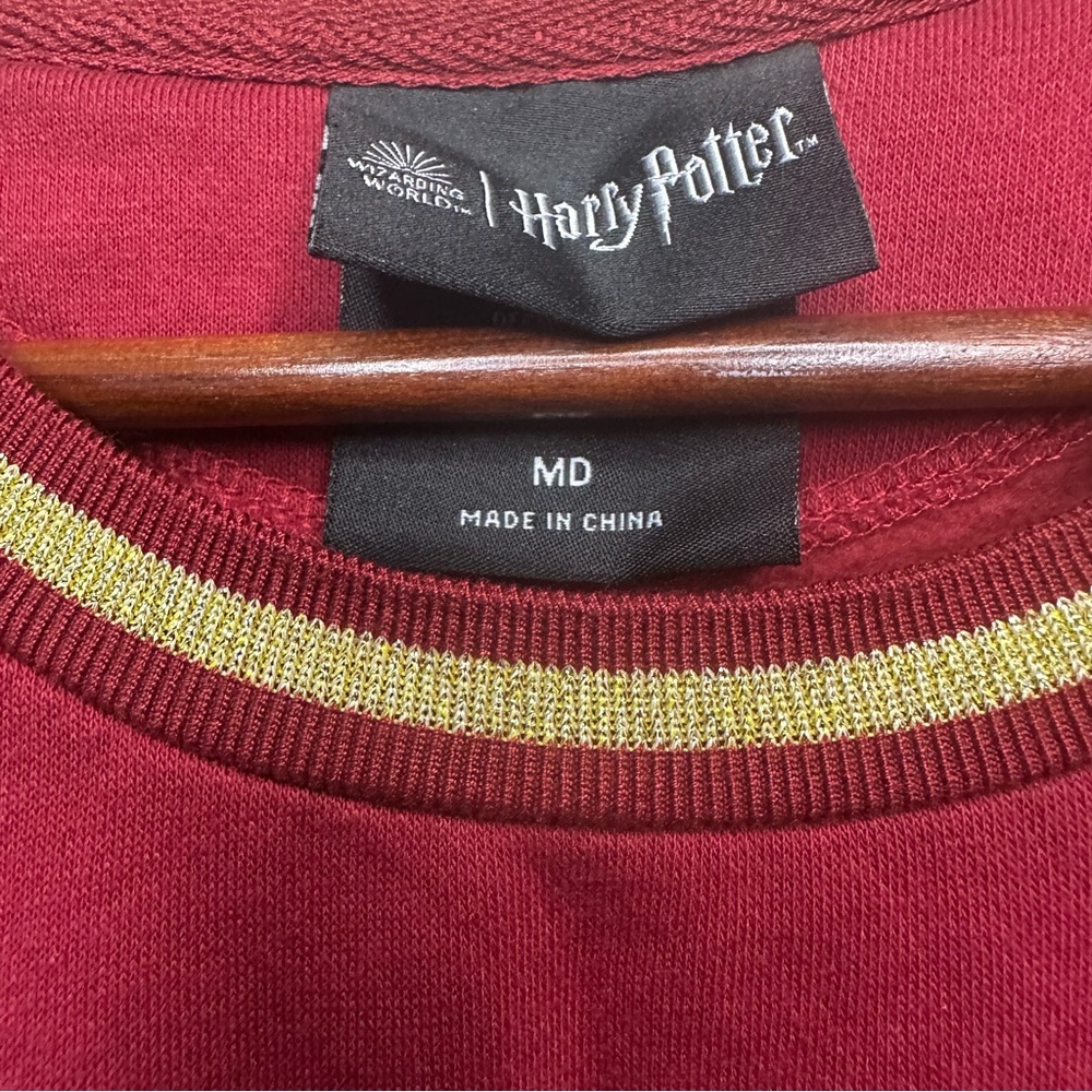 Rare Harry Potter Gryffindor Crewneck Sweater with Gold striped Hem lines SZ MD - Picture 3 of 5